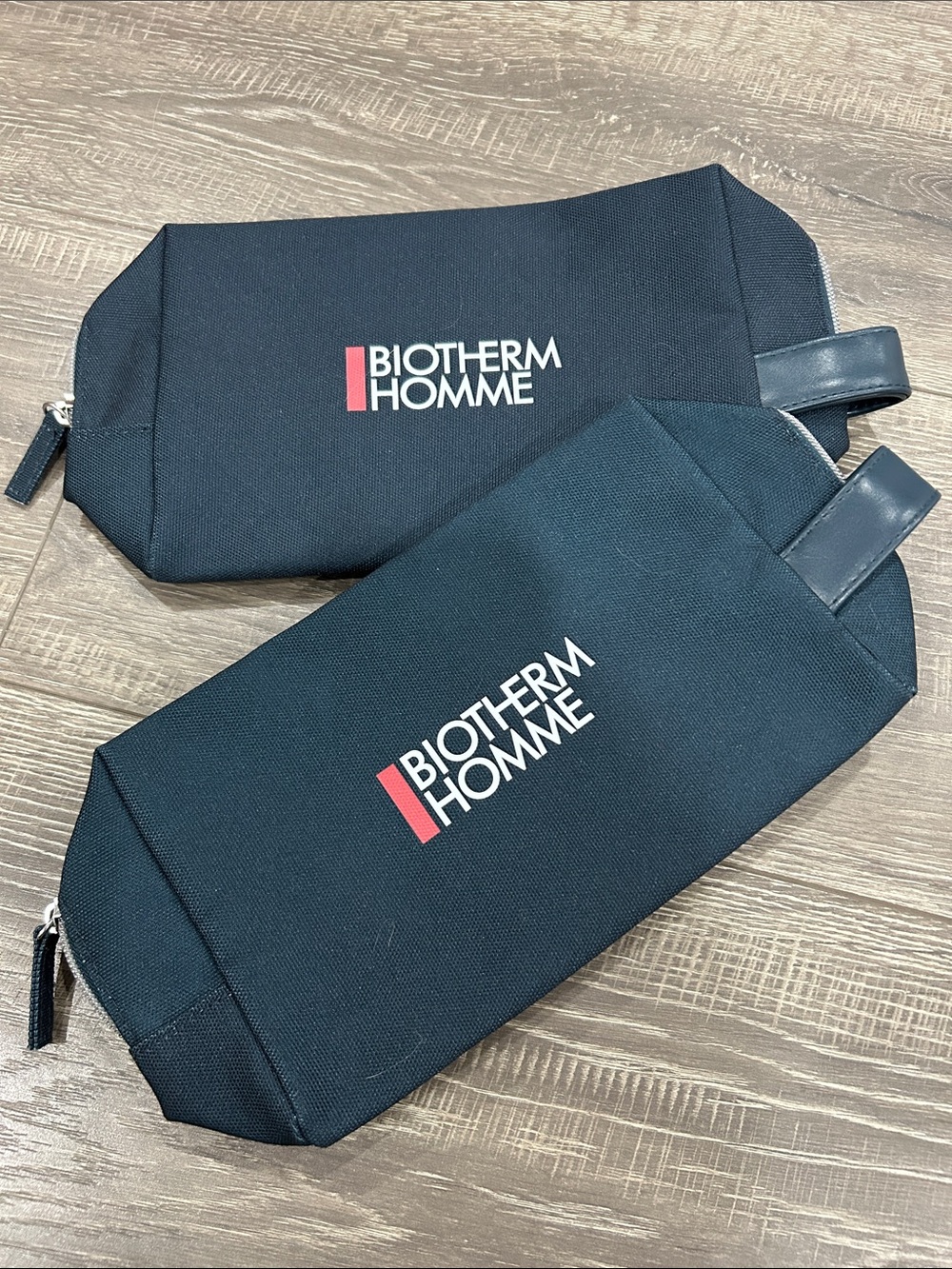 2/$10 Biotherm men’s navy pouches